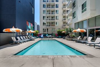 Resort style outdoor pool at g12 apartments in los angeles, ca 90015